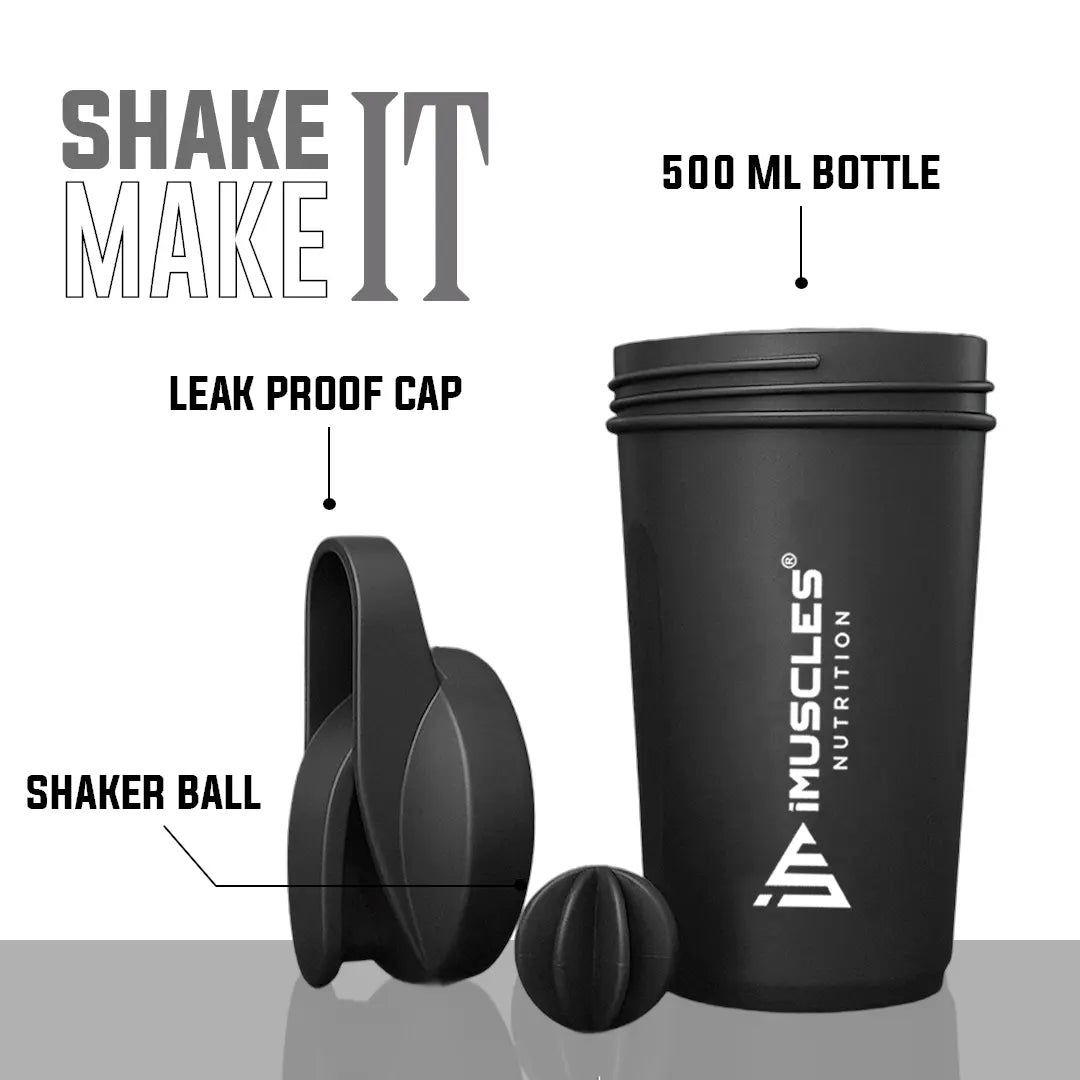 A promotional banner for the iMuscles Nutrition black shaker bottle titled black 1.png. On the left side, bold dark gray text on a light gray background reads "SHAKE UP SUCCEED" and "YOUR FITNESS GAME CHANGER". The right side features a 500 ml sleek black shaker bottle and a matching black mixing ball, labeled with "VERSATILITY" and "500 ML
