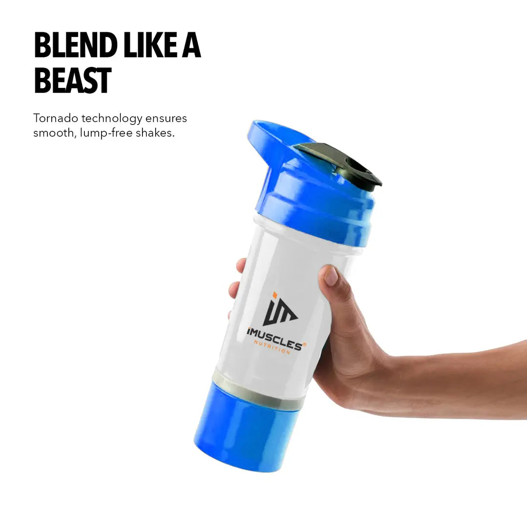 An infographic labeled "FEATURES" detailing the components of an iMuscles Nutrition shaker bottle, referenced as BLUE 3.png. The graphic shows an exploded view including a leak-proof lid and cap, a tornado blender insert, a 600 ml jar, and a compartment for storage. Circular icons on the right highlight that the product is BPA-free, easy to clean, recyclable, leakproof, and freezer safe.