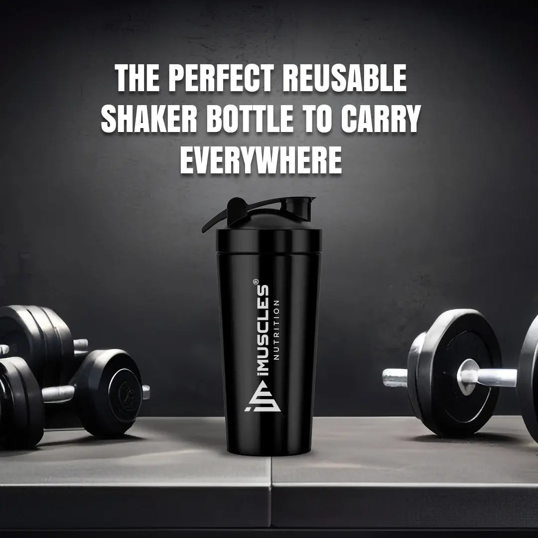 A detailed product infographic for the iMuscles Nutrition stainless steel shaker, referenced as black 4.jpg. The left side highlights key features such as being odor-free, easy to clean, recyclable, leak-proof, freezer safe, and made of stainless steel, with a central note that the logo is "ENGRAVED NOT PRINTED". The right side features an exploded view of the 739ml jar, showing the leak-proof lid, leak-proof cap, and the included whisk ball.