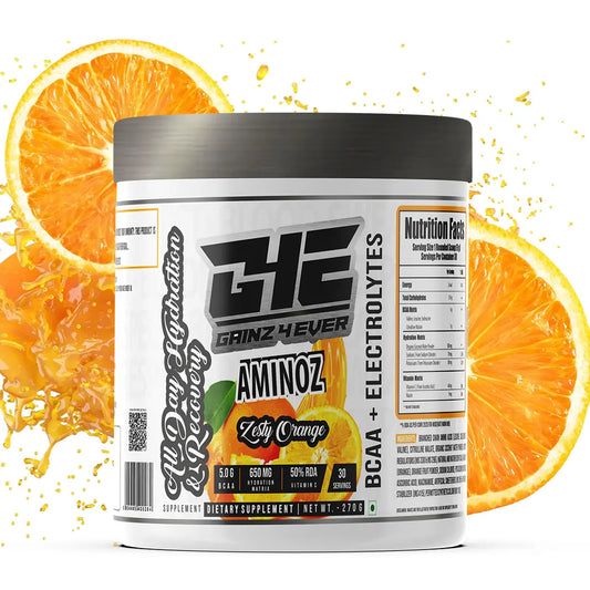 Promotional graphic for GAINZ 4 EVER AMINOZ Zesty Orange flavor. The white 270g supplement jar is centered against a background of dynamic orange liquid splashes and fresh orange slices. The label highlights "BCAA + ELECTROLYTES" and "All Day Hydration & Recovery" with callouts for 5.0g BCAA, 650mg Hydration Matrix, and 50% RDA Vitamin C.
