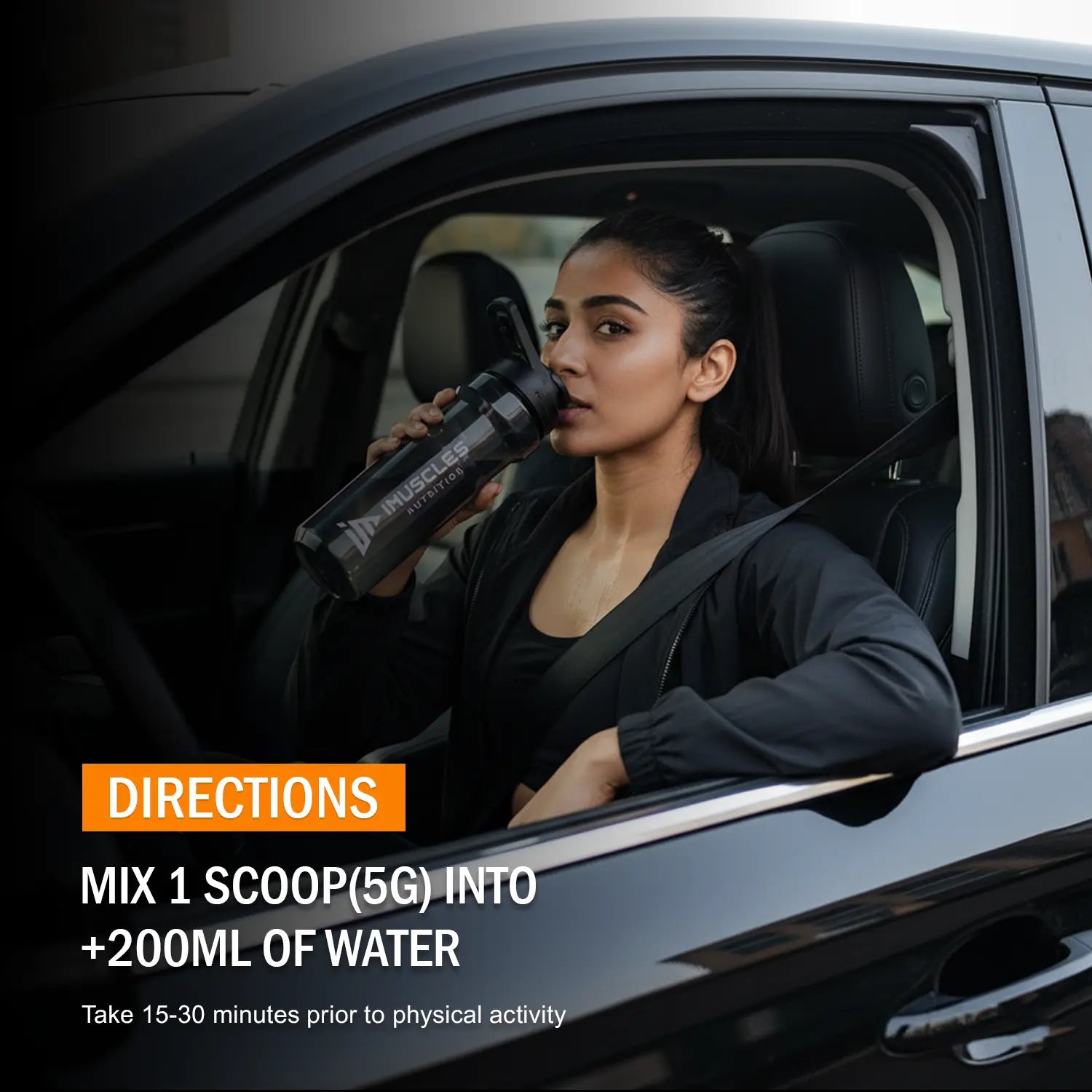 A promotional image titled "Zesty Orange 6.jpg" featuring a woman sitting in a car and drinking from an iMuscles Nutrition shaker bottle. The graphic includes "DIRECTIONS" to mix 1 scoop (5g) into 200ml of water and consume 15-30 minutes before physical activity.